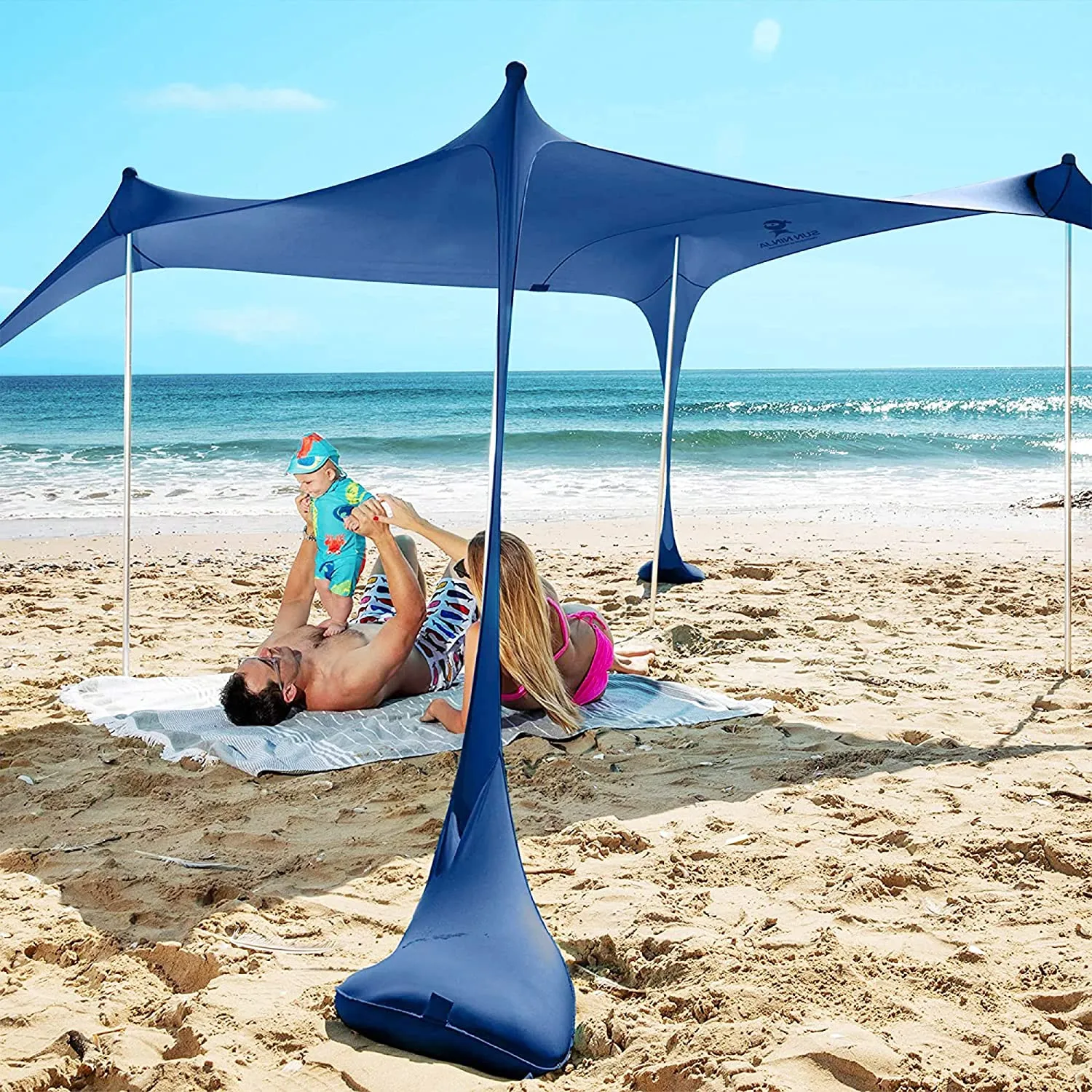 SUN NINJA Beach Tent, UPF50  Beach Shade Canopy, Pop Up Sun Shelter with Sand Shovel, Ground Pegs and Stability Poles, Outdoor Shade for Camping Trips, Fishing, Backyard Fun or Picnics
